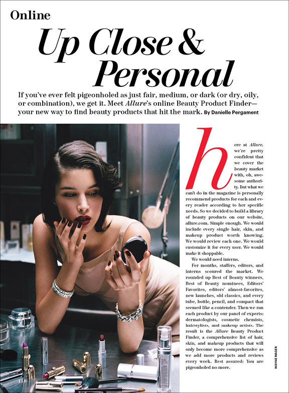 Allure "Up Close & Personal" opener: woman at a mirror applying makeup.